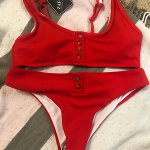 Women’s NWT suit size L (women’s 8) top/bottom